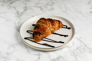 Croissant covered in chocolate