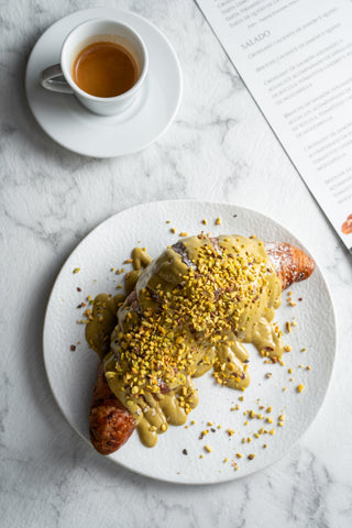 Croissant covered in pistachio